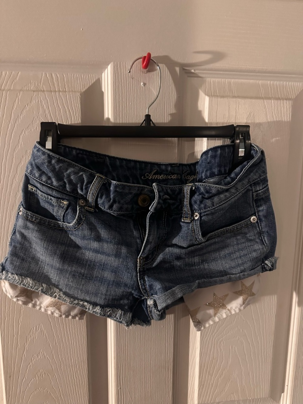 American Eagles super low waisted  Dark Blue Denim Frayed Hem Shorts